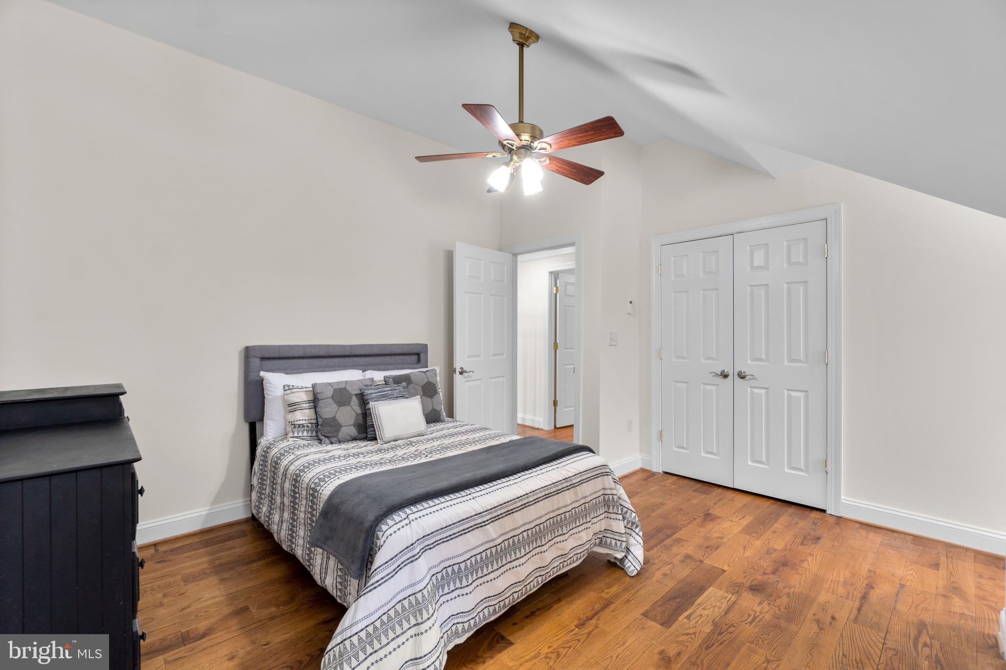 21877 Boonsboro Mountain Road Boonsboro, MD 21713 - Photo 43 of 63 a bedroom with a bed and a ceiling fan
