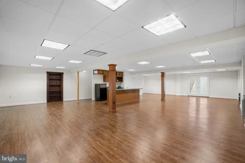 a picture of a bathroom with a shower