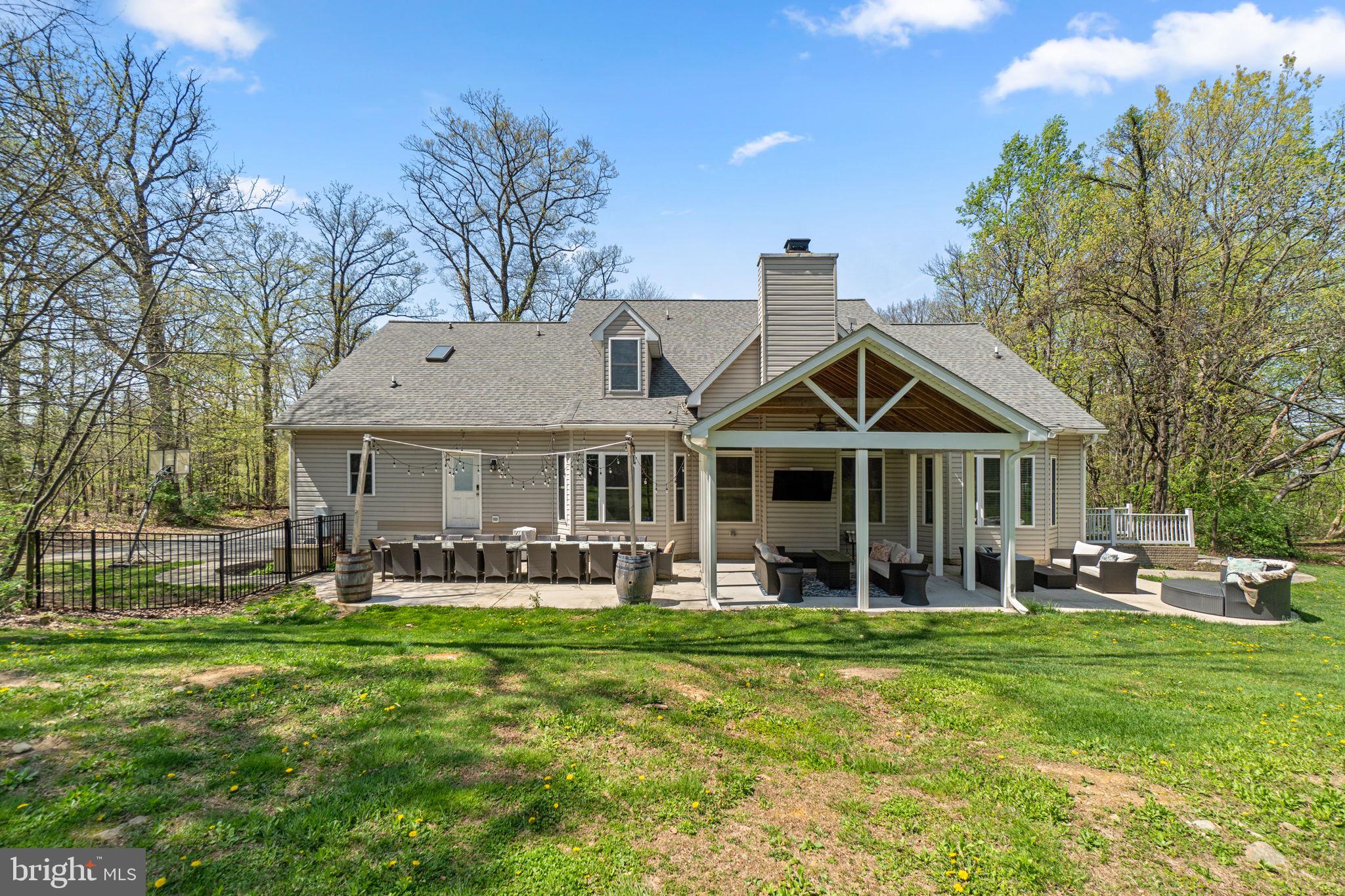 21877 Boonsboro Mountain Road Boonsboro, MD 21713 - Photo 54 of 63 a front view of a house with garden and trees