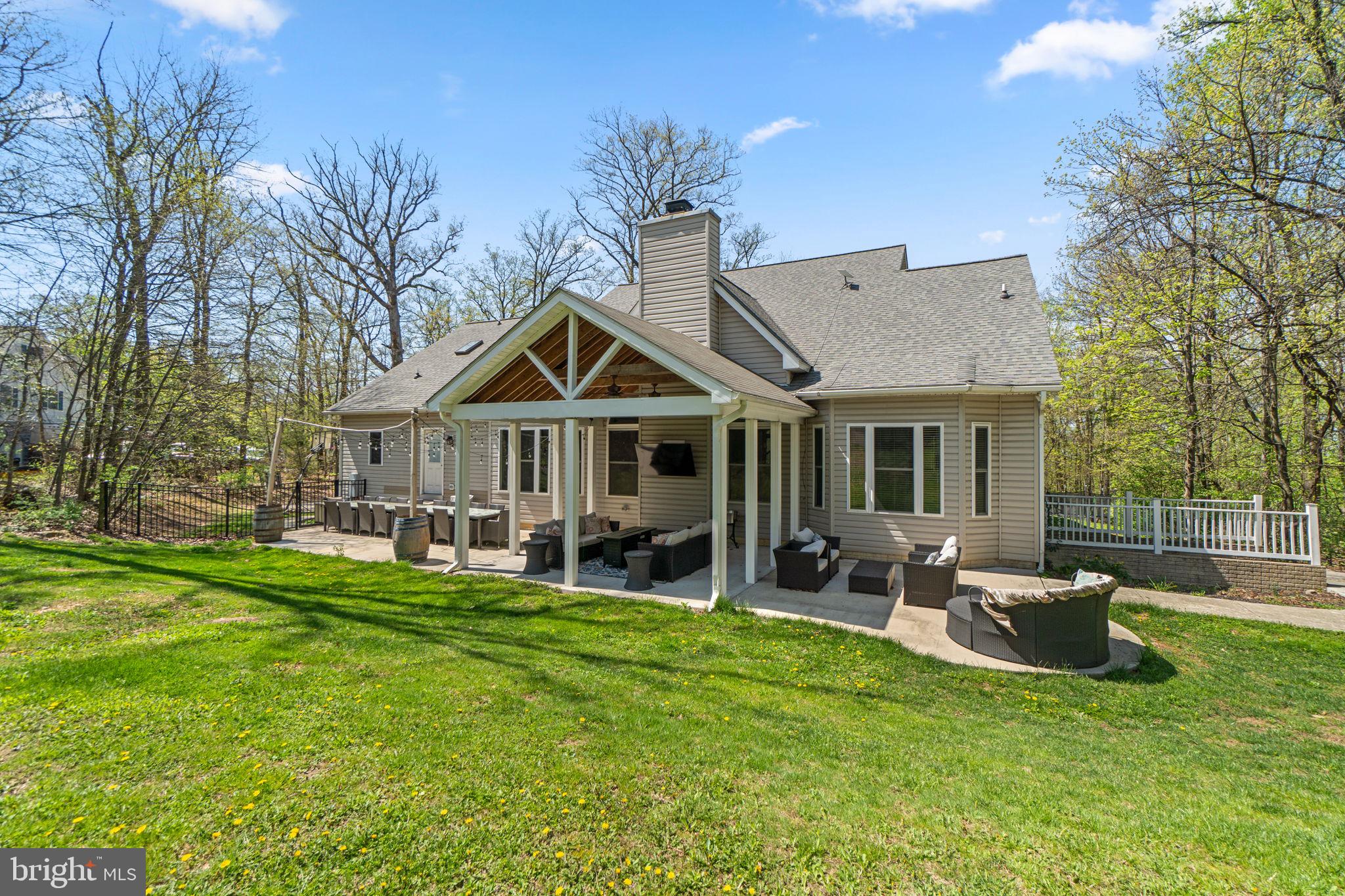 21877 Boonsboro Mountain Road Boonsboro, MD 21713 - Photo 55 of 63 a front view of a house with garden and porch