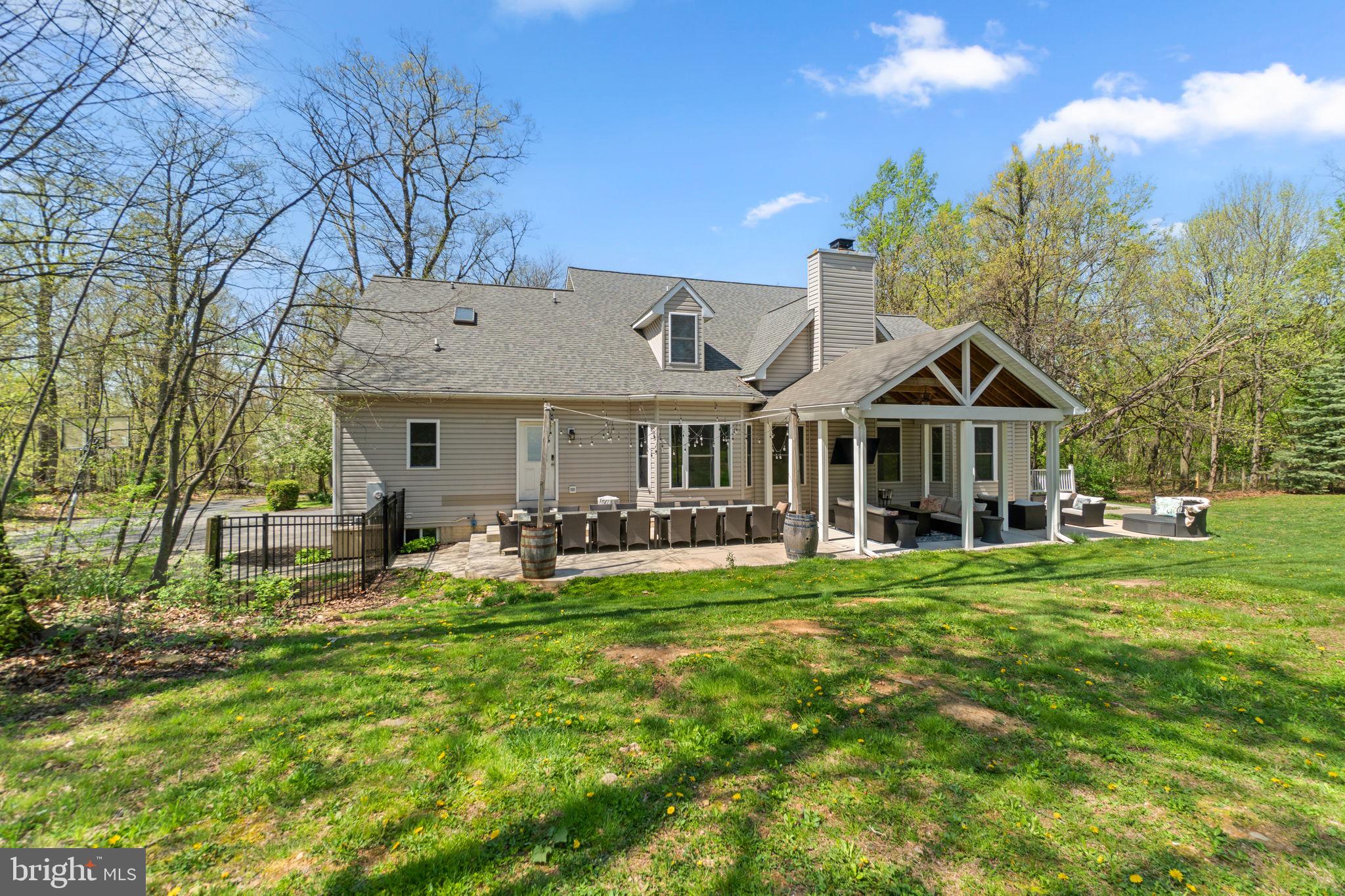 21877 Boonsboro Mountain Road Boonsboro, MD 21713 - Photo 56 of 63 a front view of a house with swimming pool and sitting area