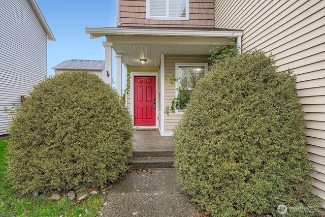 a view of a house with a small garden