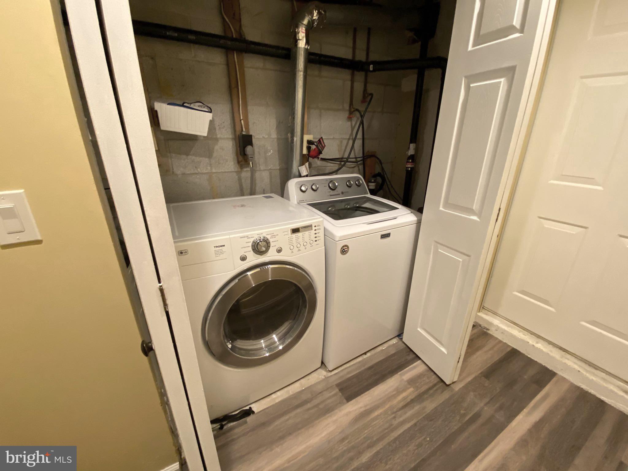 394 Croshaw Road, Unit B Wrightstown, NJ 08562 - Photo 16 of 16 a view of storage and utility room with washer and dryer