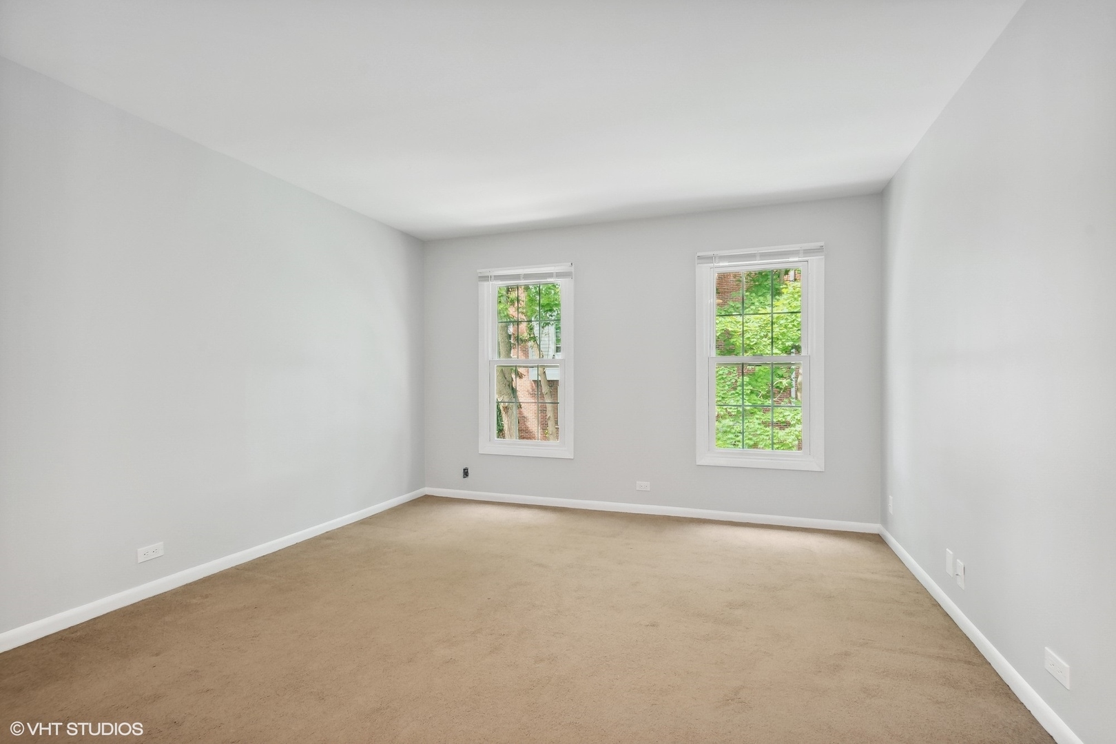 520 Shorely Drive, Unit 201 Barrington, IL 60010 - Photo 10 of 14 an empty room with windows