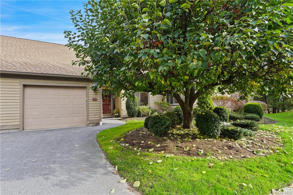 Located in a cul de sac of a tree lined street, 728D is tucked behind this beautiful Crabapple Tree.