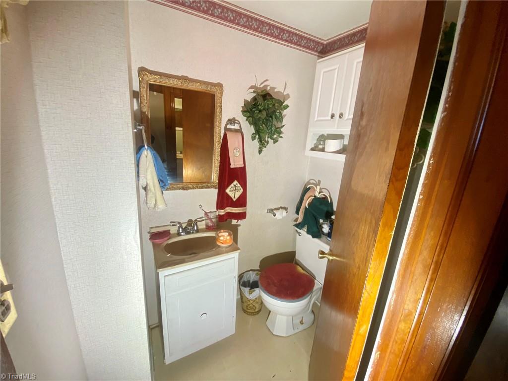 6113 White Plains Road Roaring River, NC 28669 - Photo 35 of 38 Half Bathroom