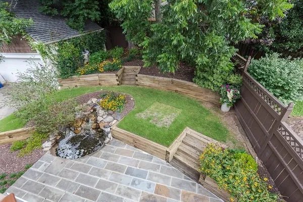 a view of a garden with potted plants