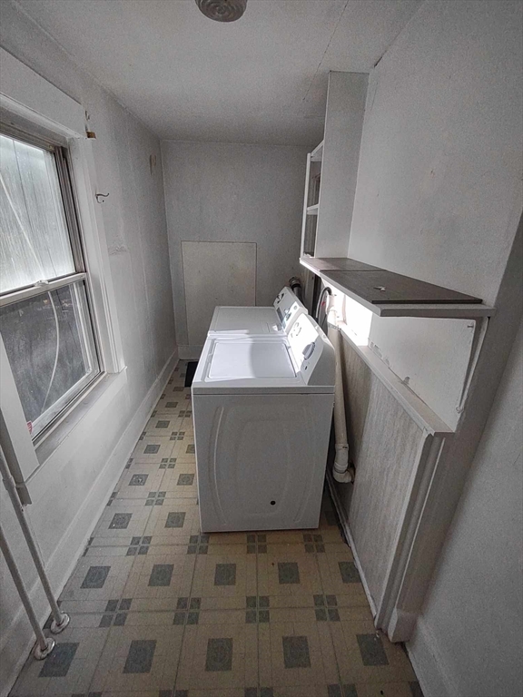 16 Kilby Street, Unit 3 Woburn, MA 01801 - Photo 4 of 12 a utility room with cabinets