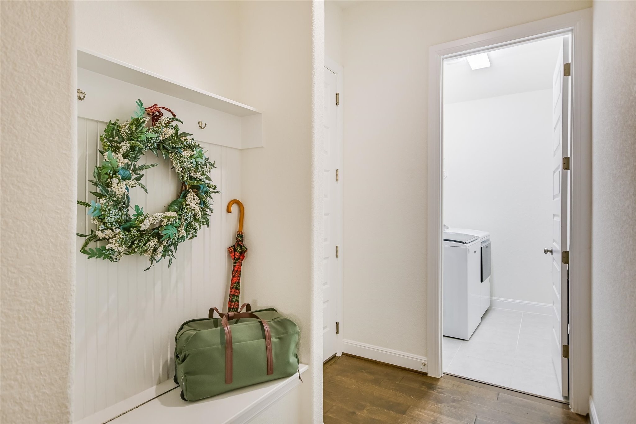 508 Peakside Circle Dripping Springs, TX 78620 - Photo 17 of 30 Laundry area with dark wood-type flooring and separate washer and dryer