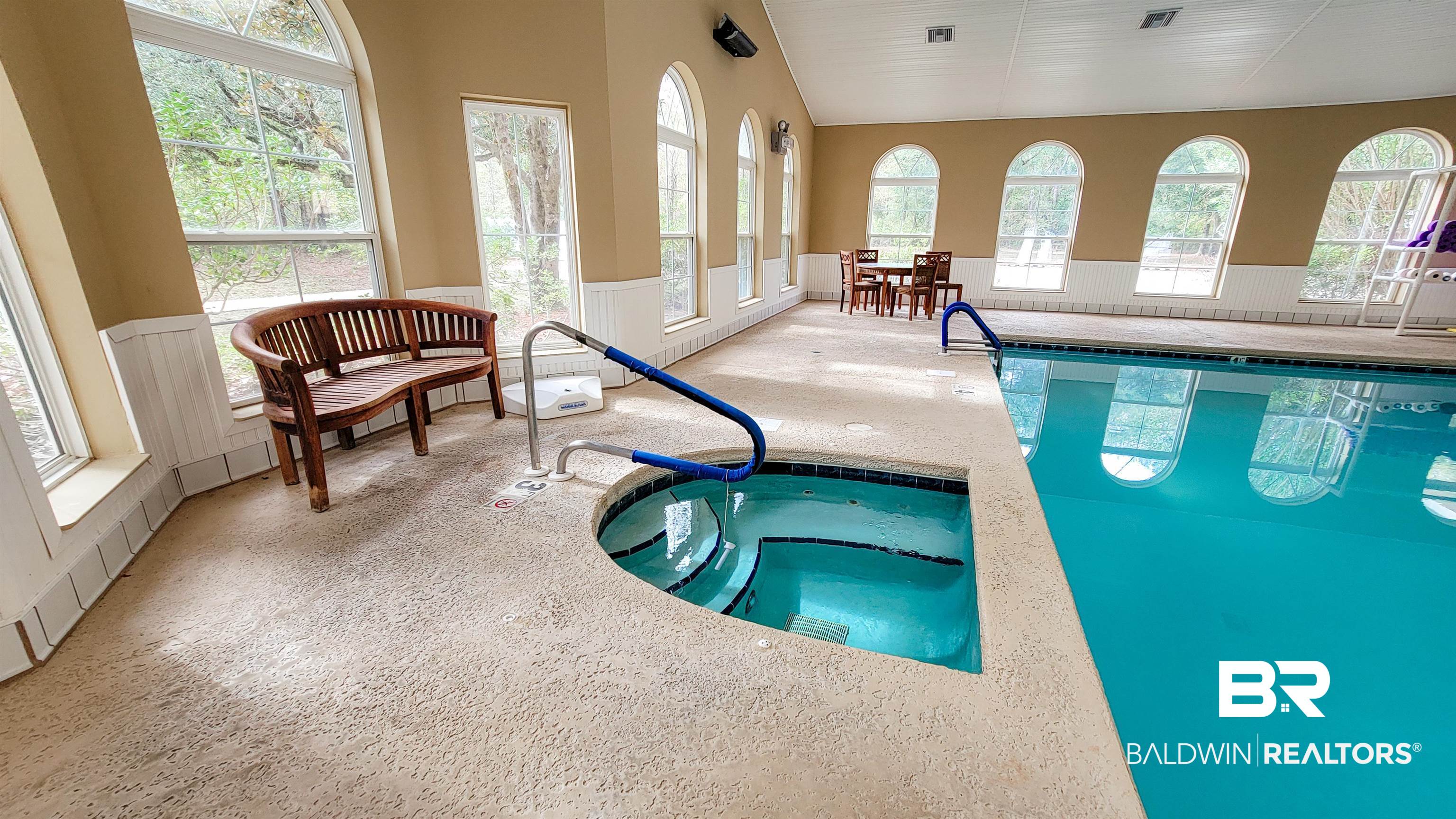 214 Hemingway Loop Foley, AL 36535 - Photo 47 of 67 Indoor community pool with a sunroom