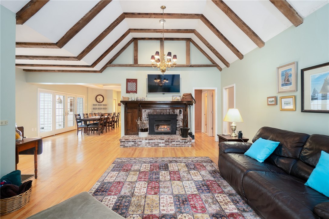 41 Johnson Road Foster, RI 02825 - Photo 18 of 49 Reclaimed wood beams frame the vaulted ceiling of the family room