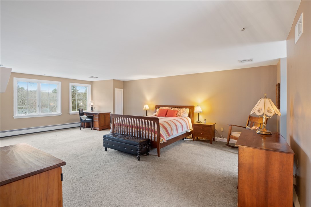 41 Johnson Road Foster, RI 02825 - Photo 27 of 49 Oversized bedroom with two dormered nooks to the right