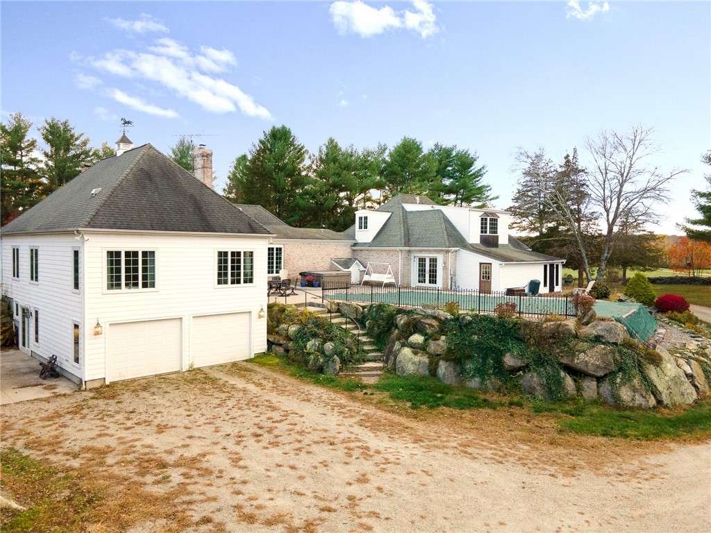 41 Johnson Road Foster, RI 02825 - Photo 3 of 49 Additional garage spaces in back of the house with plenty of extra parking for guests at your summer barbecues and pool parties!