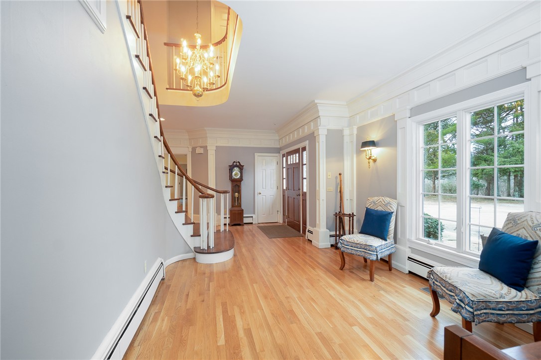 41 Johnson Road Foster, RI 02825 - Photo 7 of 49 Read by the windows or listen to the piano in the large, bright foyer