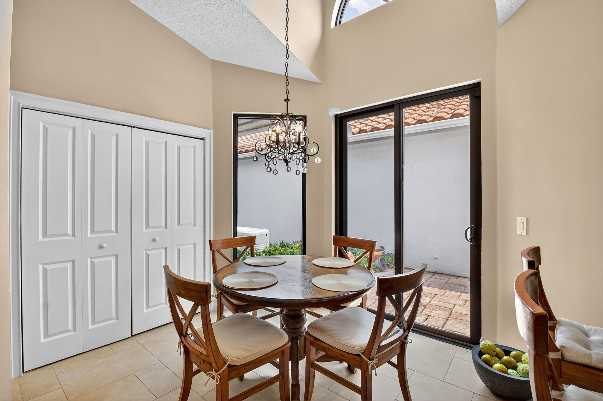 5850 Northwest 21st Avenue Boca Raton, FL 33496 - Photo 15 of 54 a view of a dining room with furniture window and wooden floor