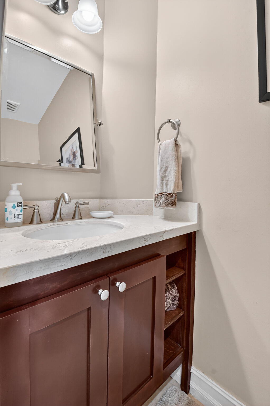 5850 Northwest 21st Avenue Boca Raton, FL 33496 - Photo 22 of 54 a bathroom with a sink a vanity and mirror