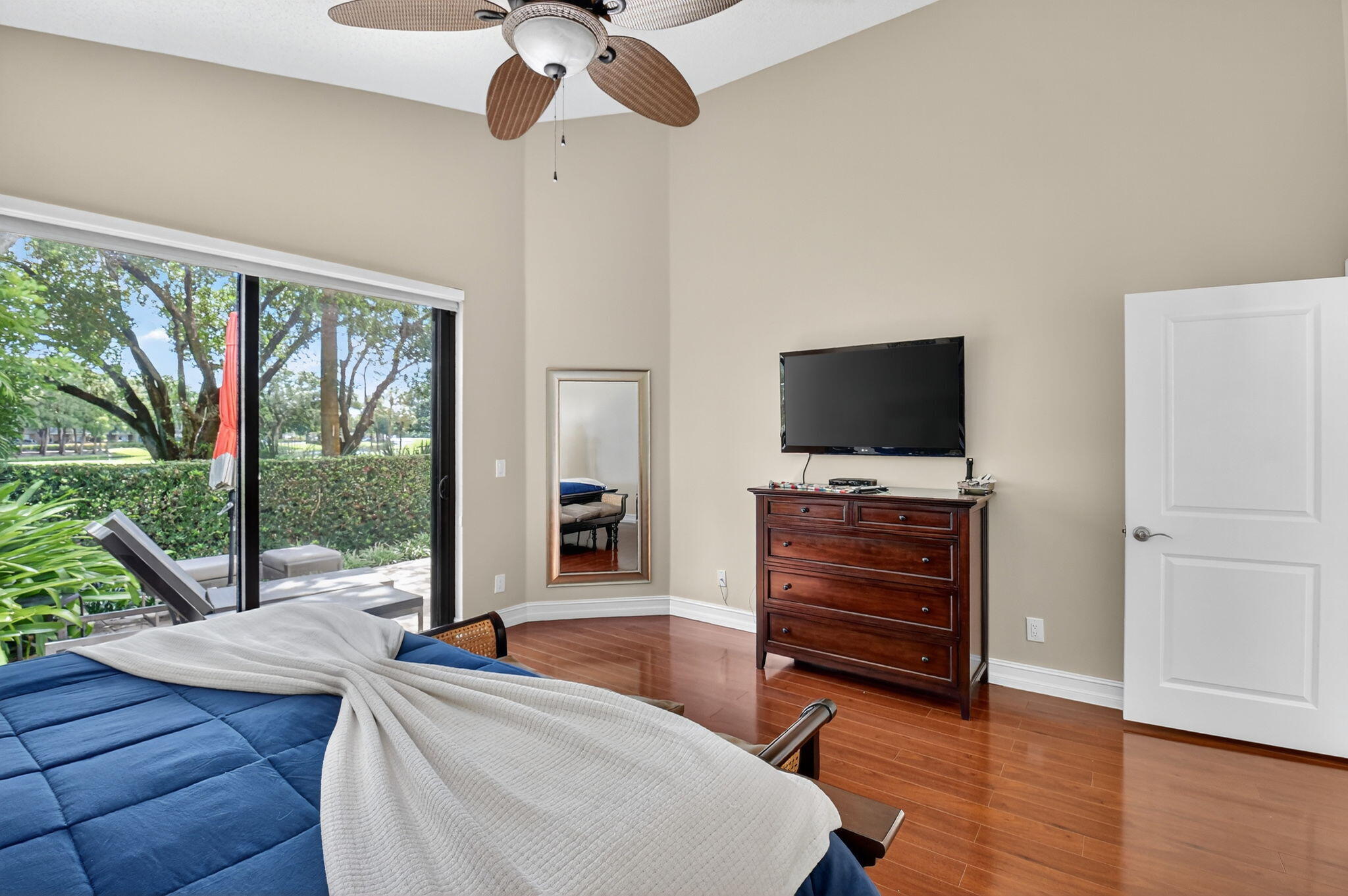 5850 Northwest 21st Avenue Boca Raton, FL 33496 - Photo 24 of 54 a living room with furniture and a flat screen tv