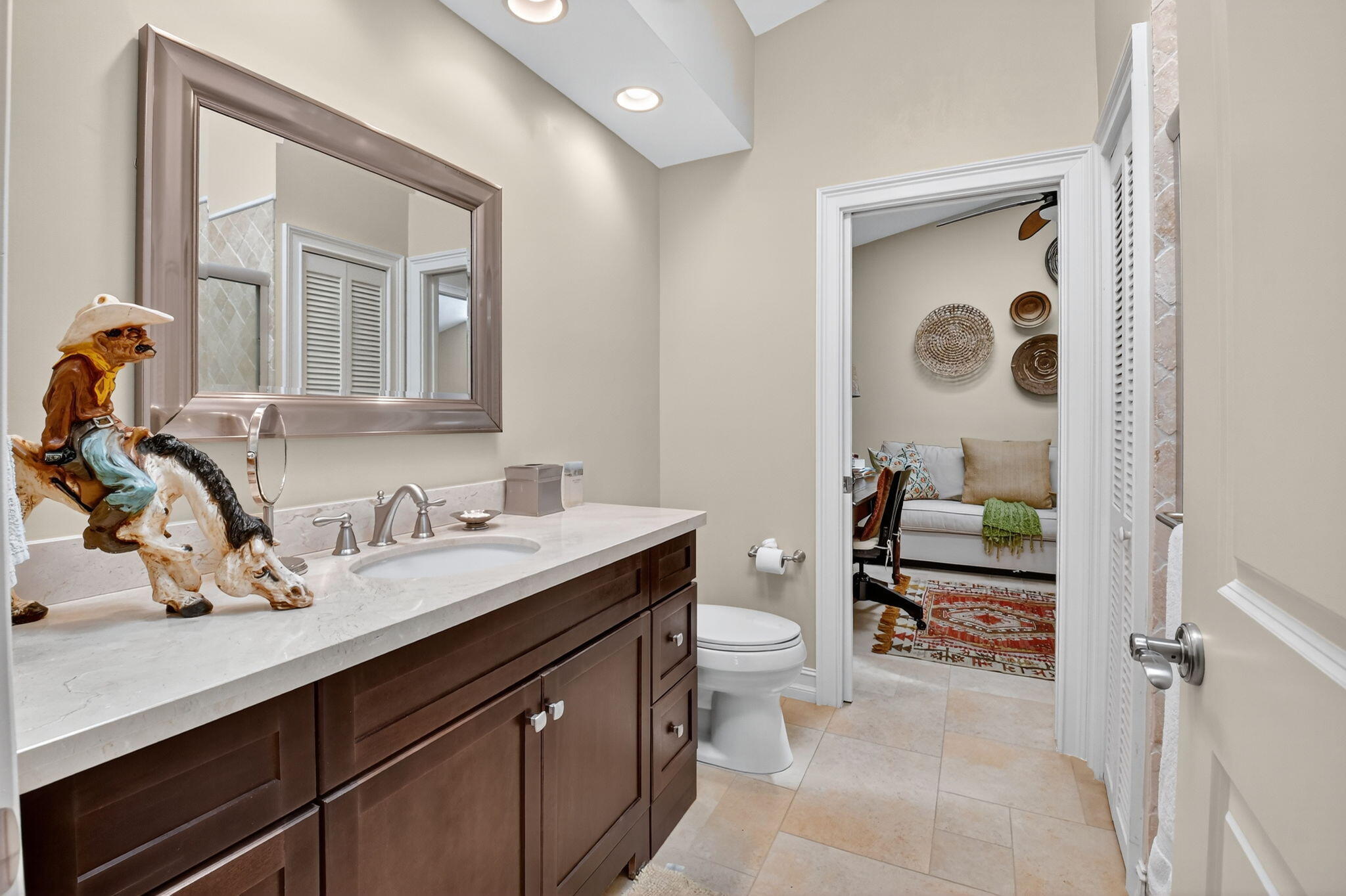5850 Northwest 21st Avenue Boca Raton, FL 33496 - Photo 29 of 54 a en suite bathroom with a granite countertop sink and a mirror