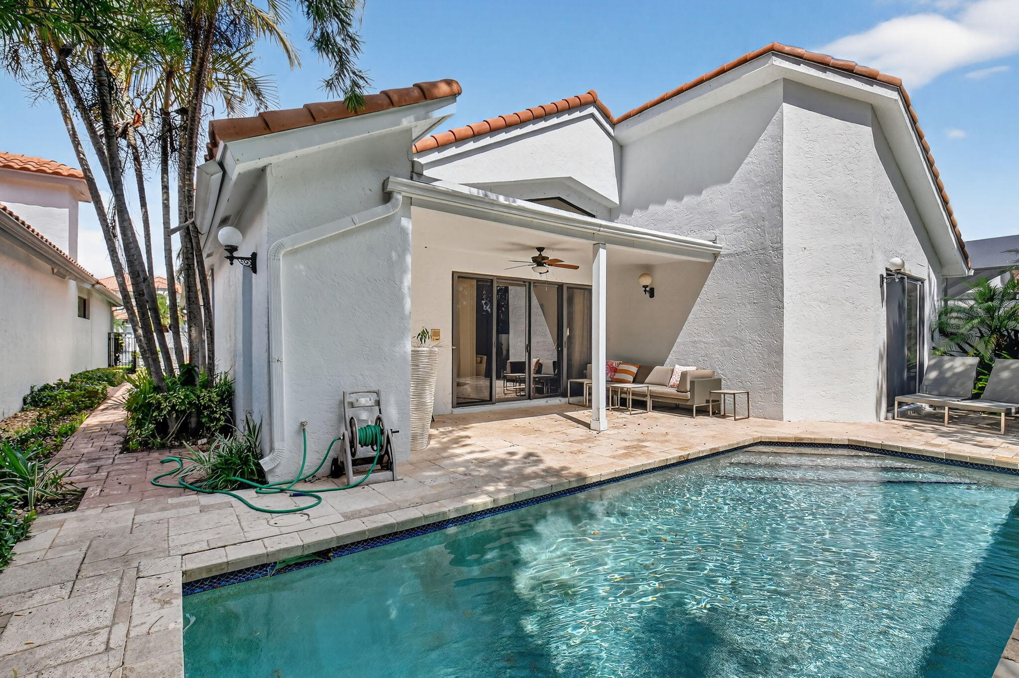 5850 Northwest 21st Avenue Boca Raton, FL 33496 - Photo 37 of 54 a house view with a outdoor space