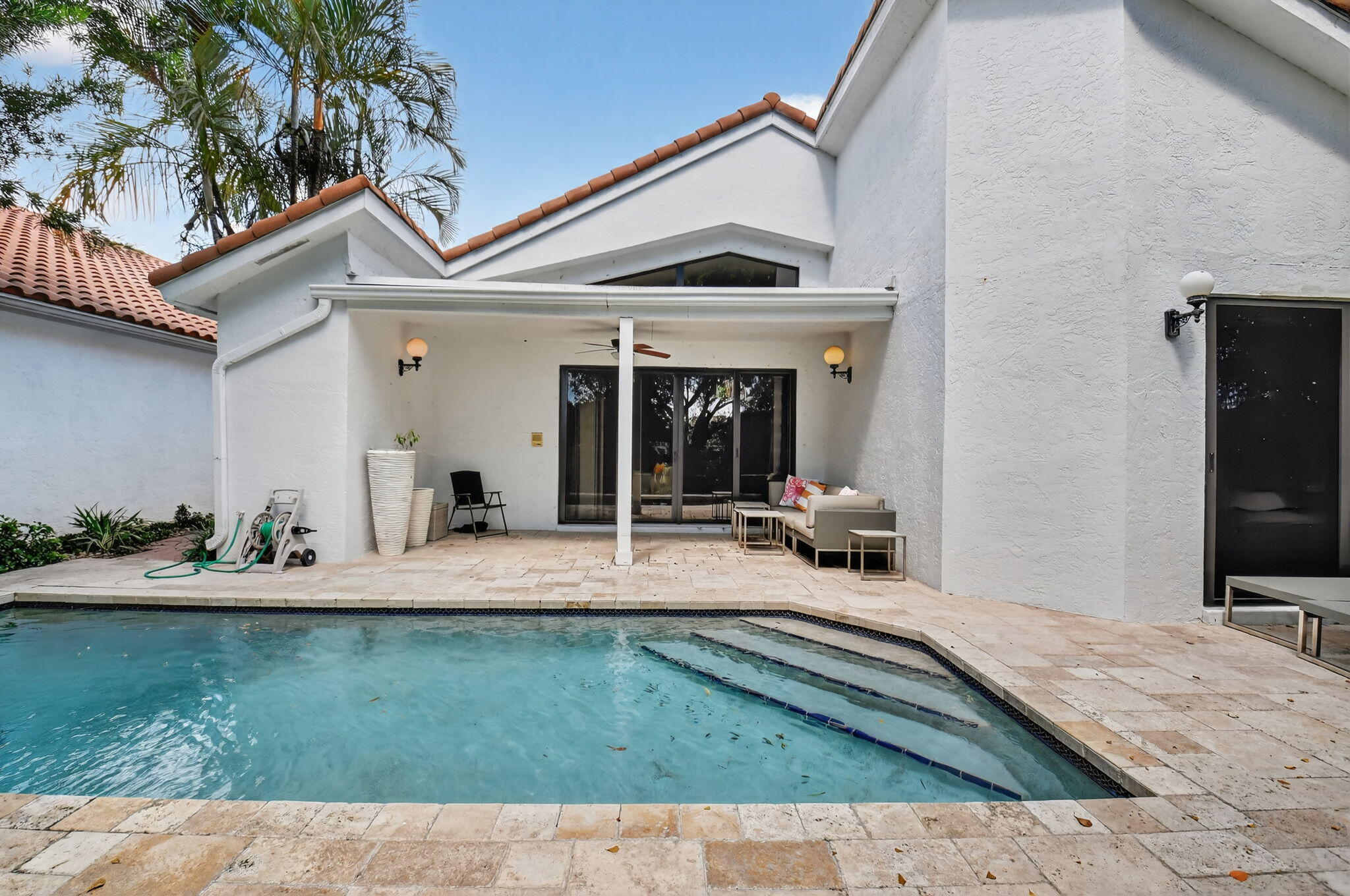 5850 Northwest 21st Avenue Boca Raton, FL 33496 - Photo 38 of 54 a view of a house with backyard and sitting area