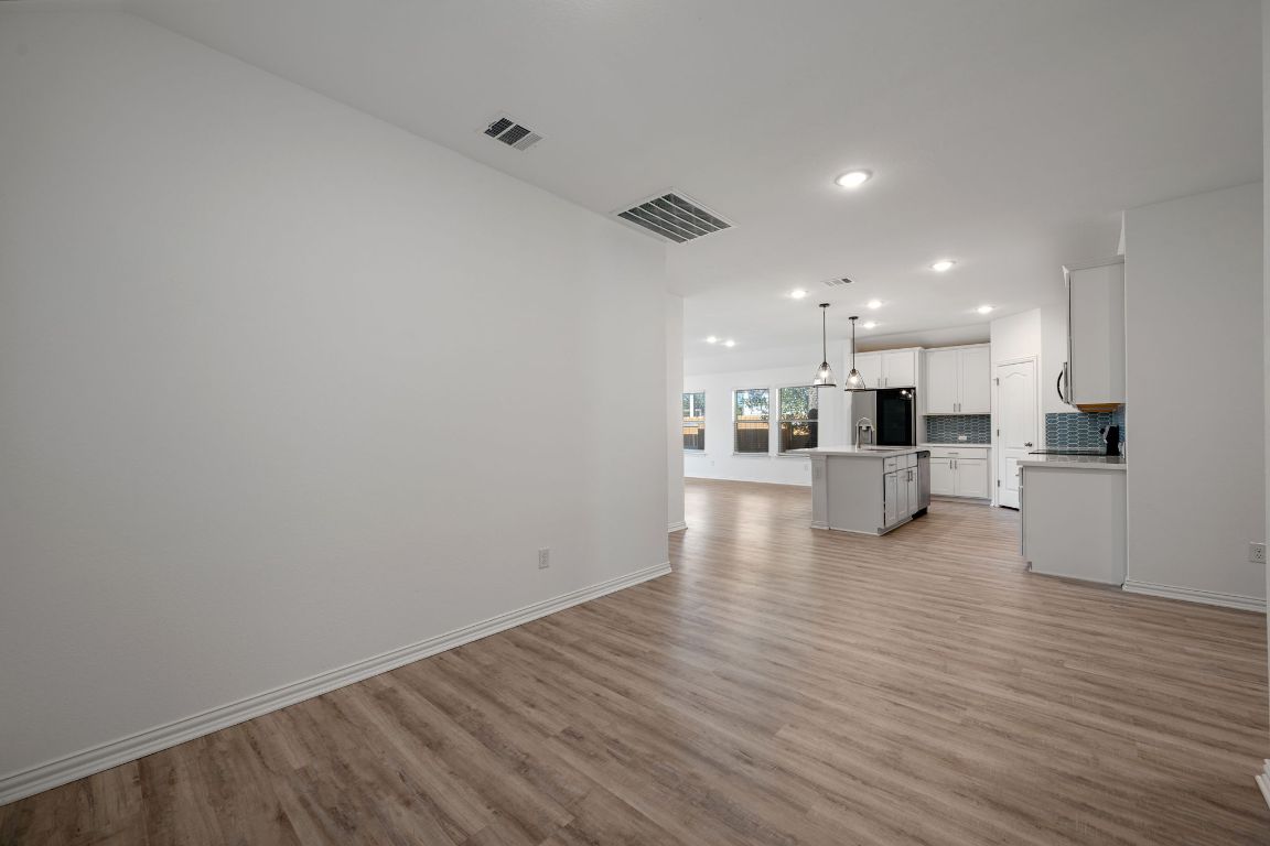 1109 Morning View Road Georgetown, TX 78628 - Photo 13 of 40 a view of kitchen with wooden floor