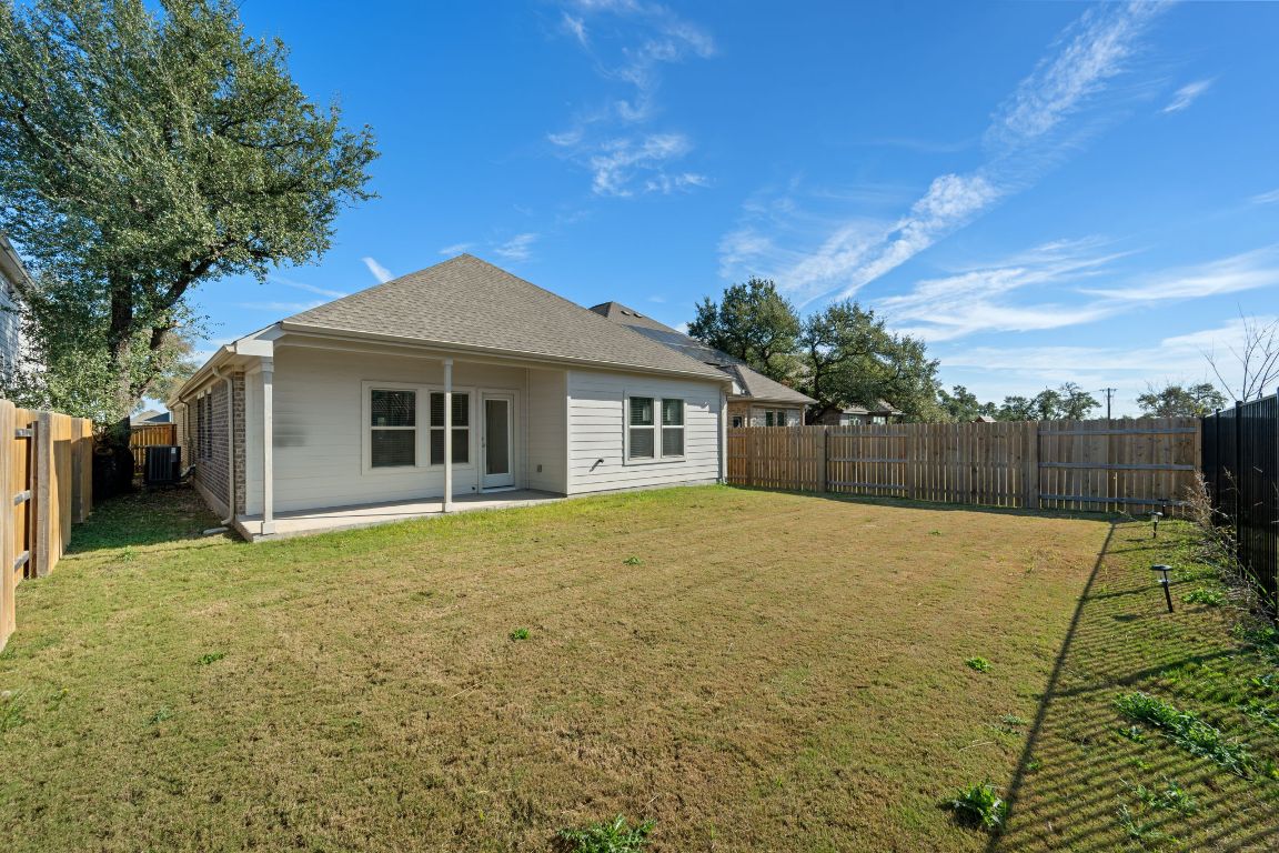 1109 Morning View Road Georgetown, TX 78628 - Photo 25 of 40 a backyard of a house with table and chairs