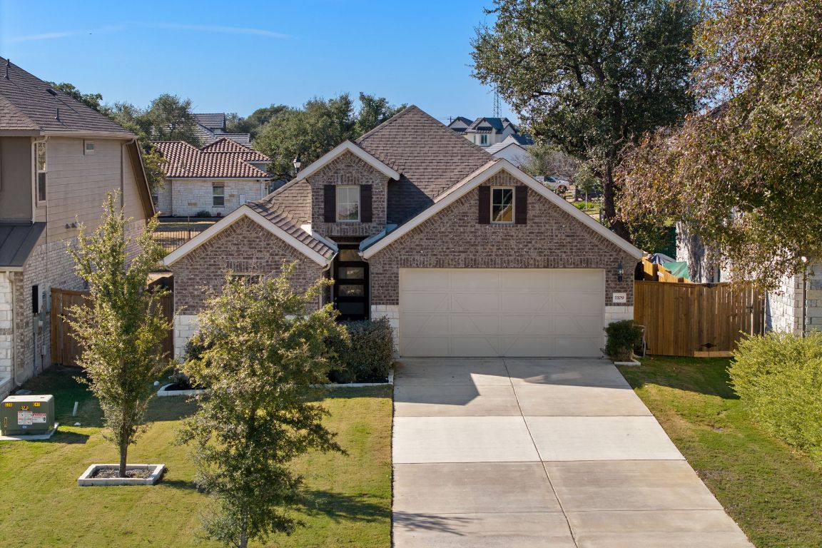 1109 Morning View Road Georgetown, TX 78628 - Photo 27 of 40 a front view of a house with a yard