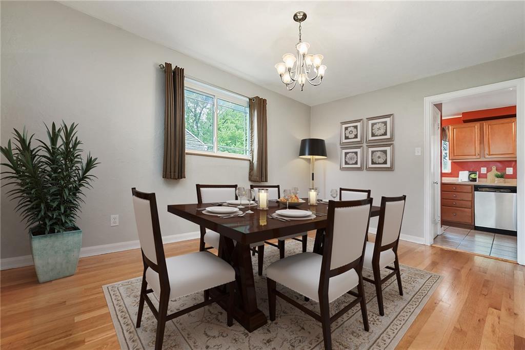 1161 Prospect Road Pittsburgh, PA 15227 - Photo 18 of 39 a view of a dining room with furniture window and wooden floor
