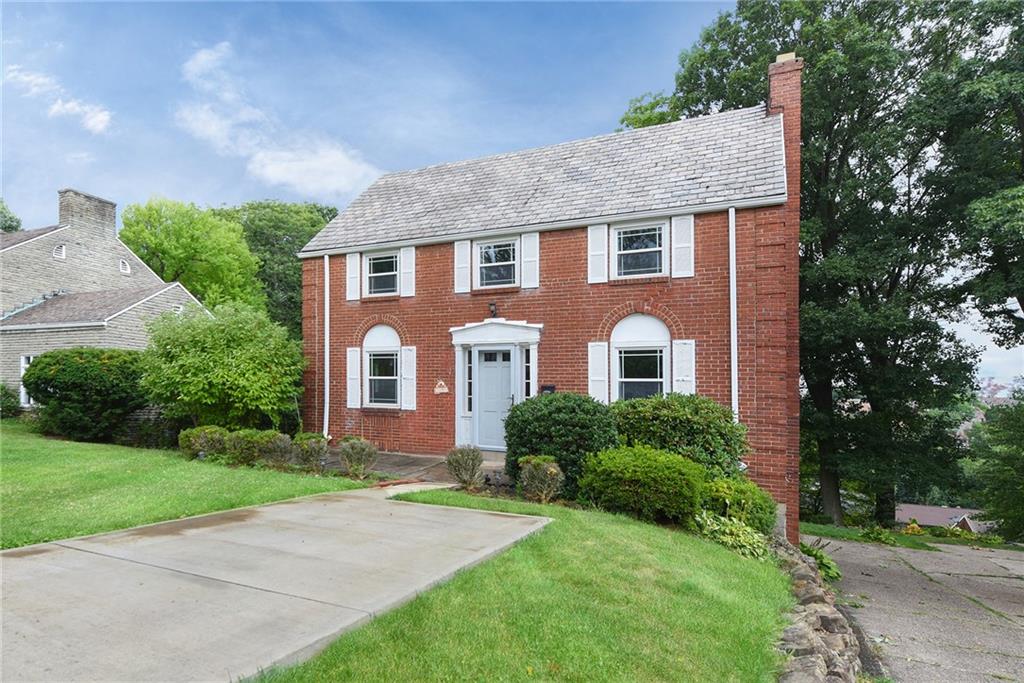 1161 Prospect Road Pittsburgh, PA 15227 - Photo 2 of 39 a front view of a house with yard and green space
