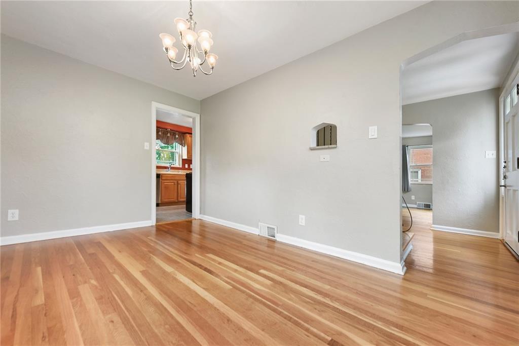 1161 Prospect Road Pittsburgh, PA 15227 - Photo 21 of 39 a view of livingroom with hardwood floor and hallway