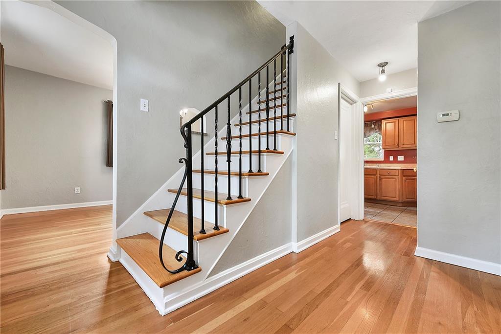 1161 Prospect Road Pittsburgh, PA 15227 - Photo 3 of 39 a view of a hallway with wooden floor and stairs