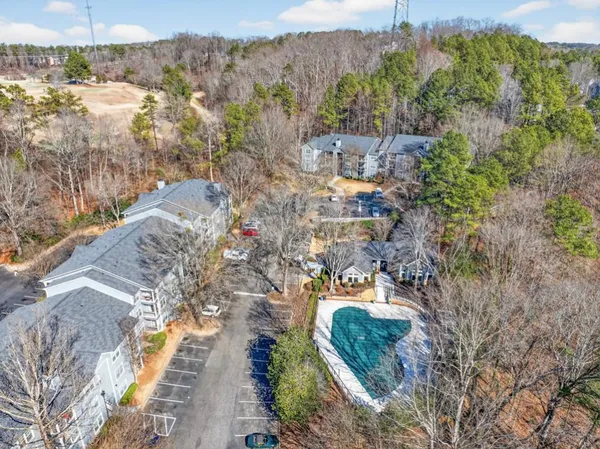 a view of swimming pool in a backyard