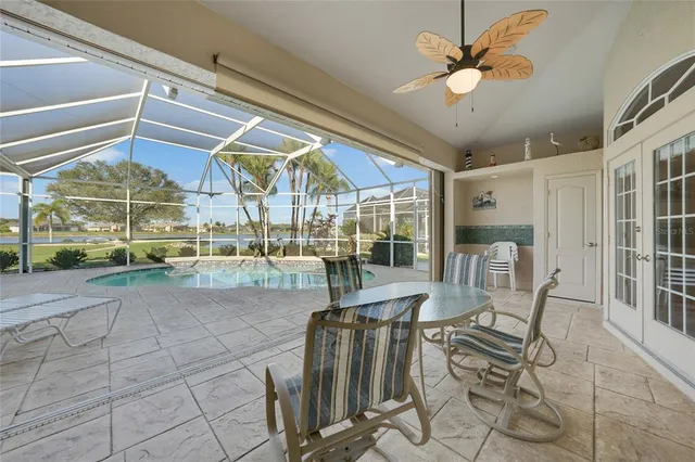 a view of a swimming pool with a patio