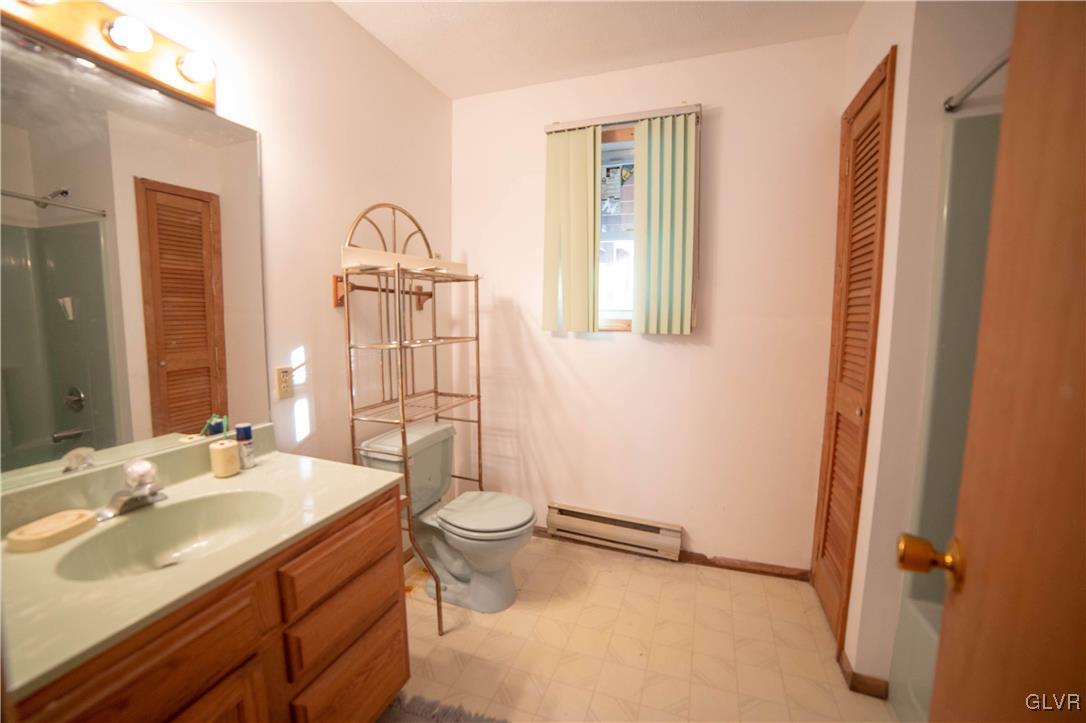 6360 Decker Road Bushkill, PA 18324 - Photo 24 of 35 a bathroom with a sink and a mirror