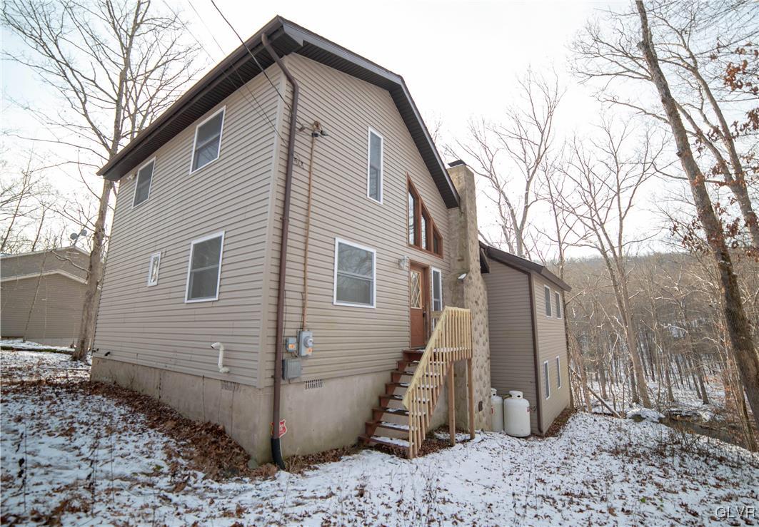 6360 Decker Road Bushkill, PA 18324 - Photo 3 of 35 a view of a house with a yard