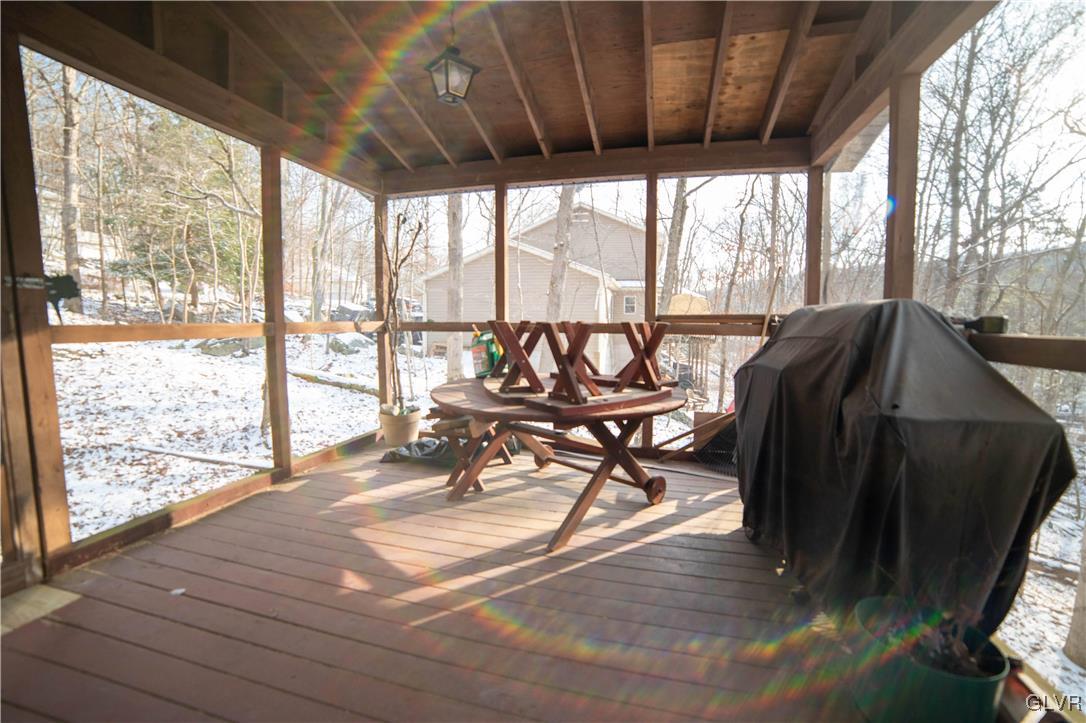 6360 Decker Road Bushkill, PA 18324 - Photo 33 of 35 a living room with furniture and a large window