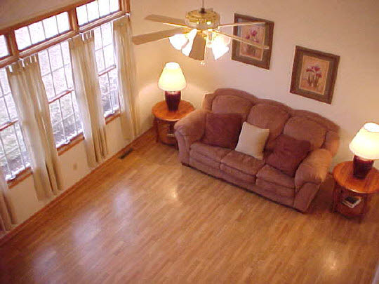8188 Mcmichael Road Caledonia, IL 61011 - Photo 2 of 6 a living room with furniture and a large window