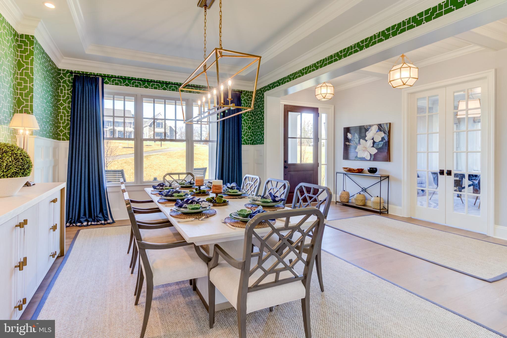 319 Iven Avenue Wayne, PA 19087 - Photo 11 of 44 a view of a dining room with furniture window and wooden floor