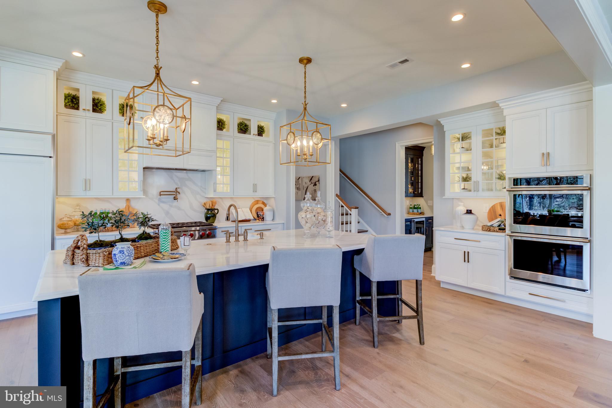 319 Iven Avenue Wayne, PA 19087 - Photo 14 of 44 a dining room with furniture and wooden floor