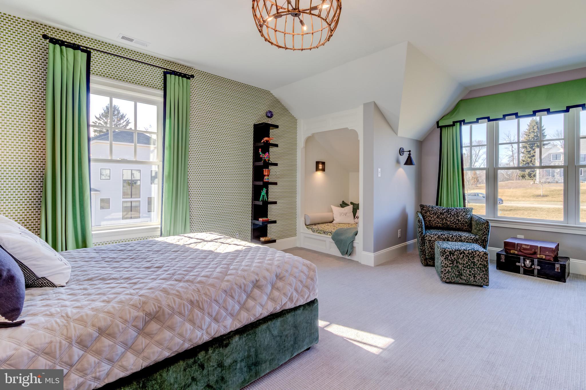 319 Iven Avenue Wayne, PA 19087 - Photo 26 of 44 a bedroom with a bed and a large window