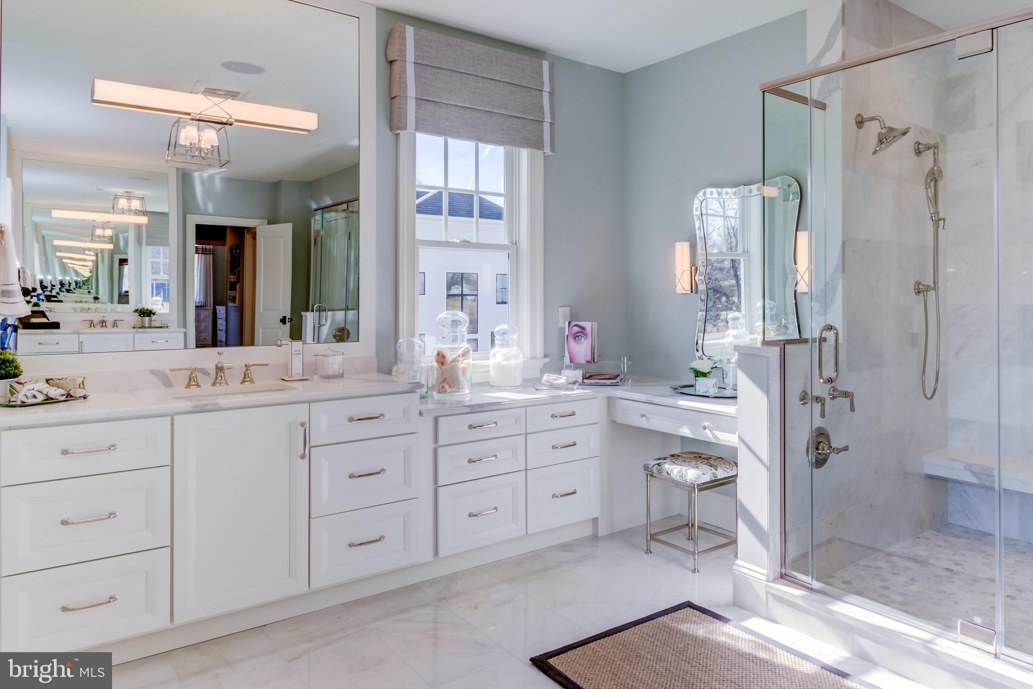 319 Iven Avenue Wayne, PA 19087 - Photo 39 of 44 a bathroom with a granite countertop sink mirror and a