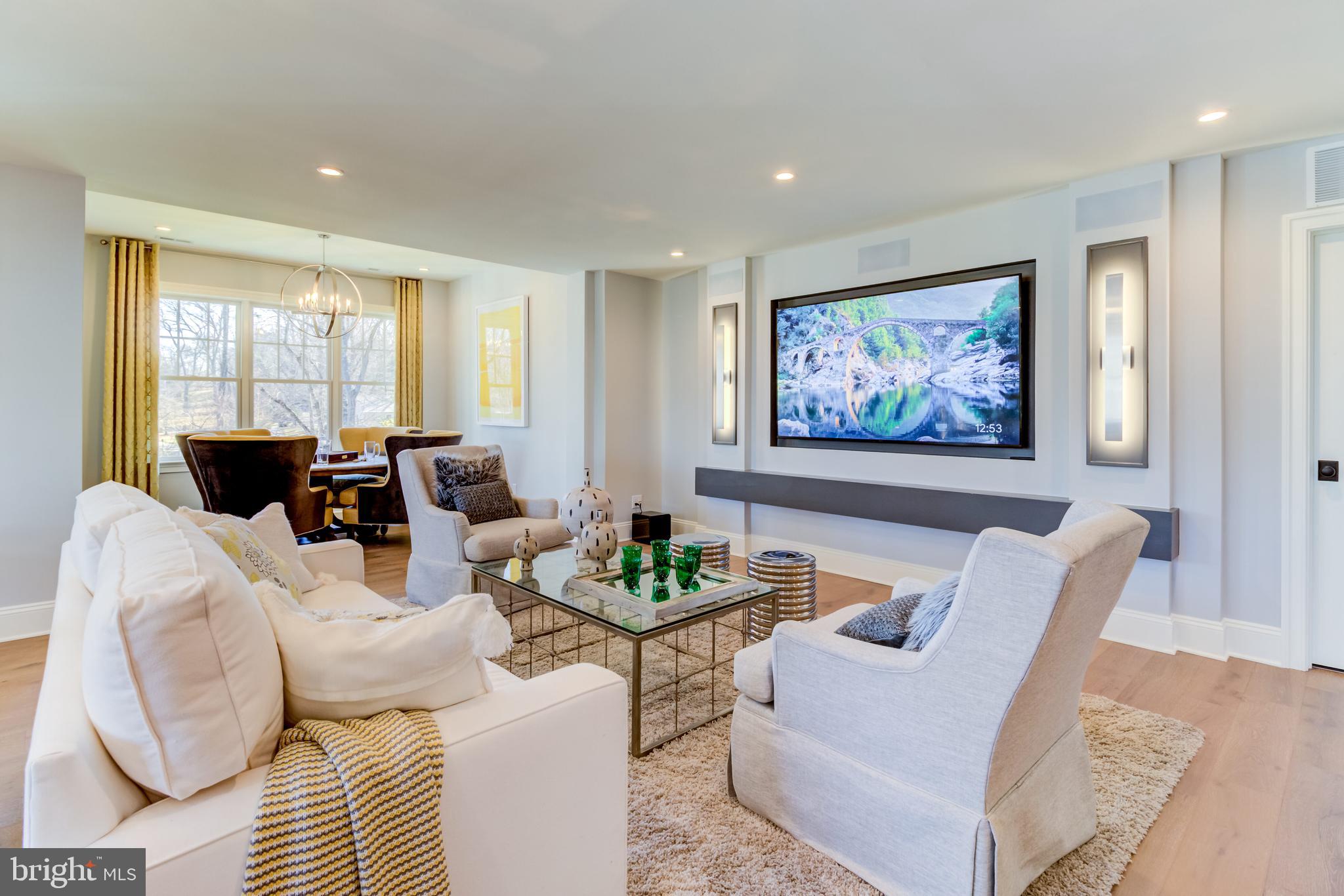 319 Iven Avenue Wayne, PA 19087 - Photo 42 of 44 a living room with furniture two windows and a table