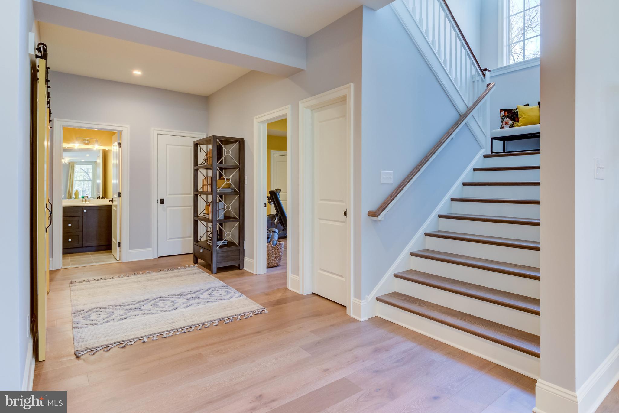 319 Iven Avenue Wayne, PA 19087 - Photo 44 of 44 a view of a bedroom with wooden floor and stairs