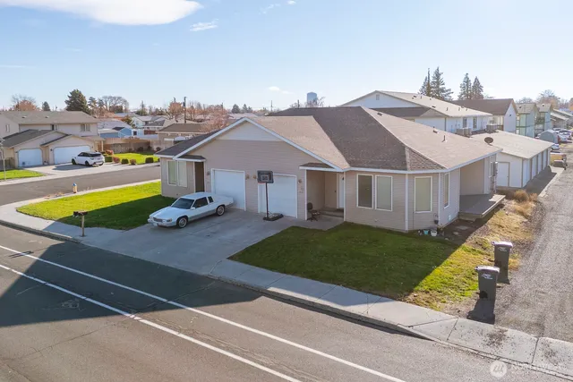 a aerial view of a house with a garden and plants
