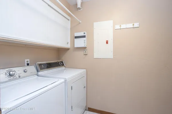 a view of a bathroom with a glass door shower