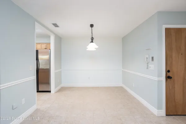 a kitchen with a sink cabinets and window