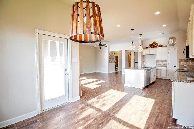 a view of backyard with a garden and entertaining space