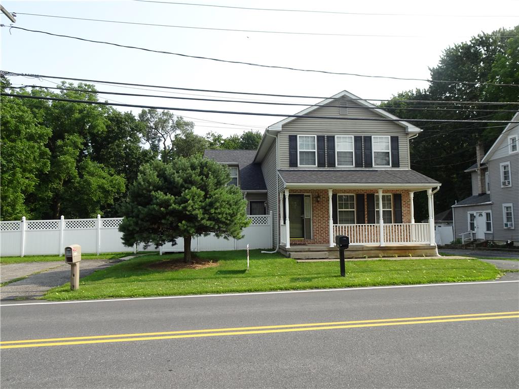 4435 Steuben Road Bethlehem, PA 18020 - Photo 43 of 43 A classic facade with a welcoming porch and crisp white fence offers inviting curb appeal.