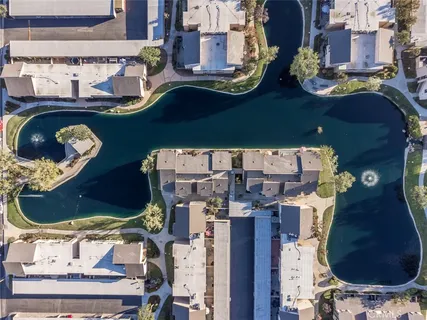 a view of a building with a table and chairs