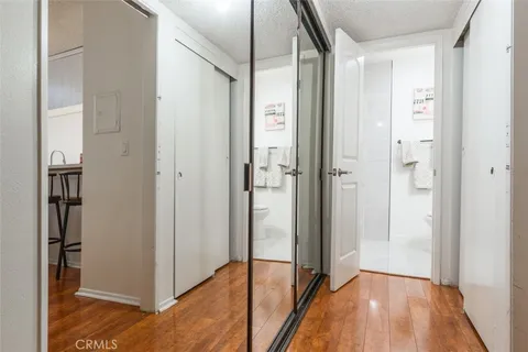 a bathroom with a toilet sink and shower